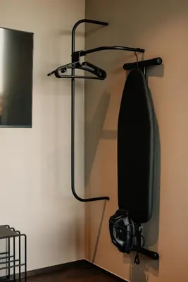 a black shower in a corner of a room at Coliving - Bord de Meuse - L'échappée Mosane in Oupeye