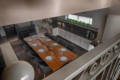 an overhead view of a long table in a room at Tussen Hemel en Maas in Dilsen-Stokkem
