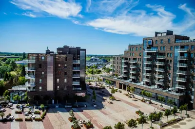 an aerial view of a city with tall buildings at Hotel Stayen in Sint-Truiden