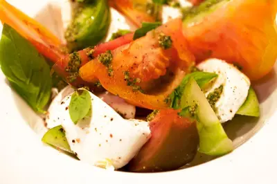 a plate of food with vegetables in a bowl at Holiday Inn Hasselt by IHG in Hasselt