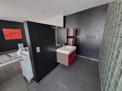 a bathroom with a sink and a toilet at Sérénité - Espace Détente Ensival in Ensival