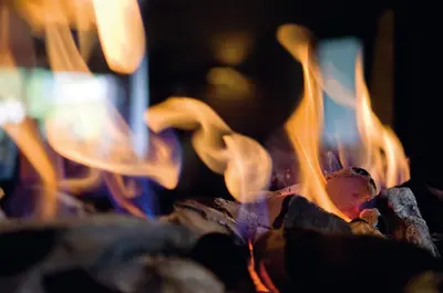 a close up of a fire in a fireplace at Eurotel Lanaken in Lanaken