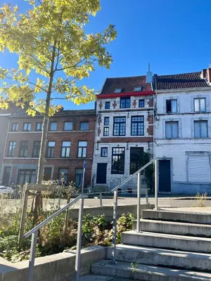 a building with stairs in front of a building at Maison Sainte-Marguerite in Liège