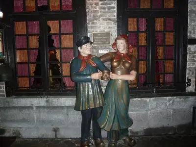 a statue of two people standing next to each other at Eurotel in Liège