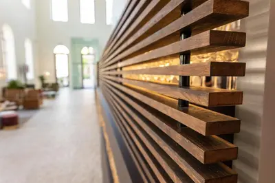 a wooden wall in a lobby at Eburon Hotel in Tongeren