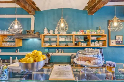 a kitchen with a counter with a bowl of food at Chez Mamy in Liège