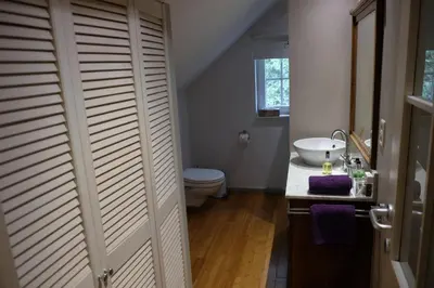 a bathroom with a toilet and a sink at Abeljano in Hasselt