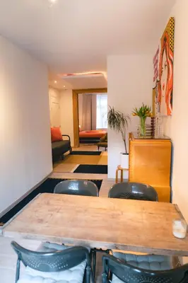 a conference room with a table and chairs at Lyves in Liège