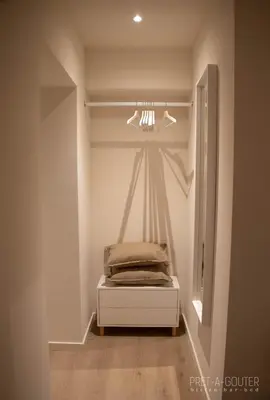 a room with a closet with a bed in it at PRET A GOUTER bistro bar bed in Heusden - Zolder