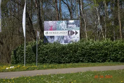 a sign for a harlem knot on the side of a road at Hengelhoef vakantieverblijf DEN 5 in Houthalen-Helchteren