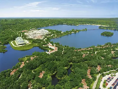 an aerial view of a resort on a lake at Center Parcs Vossemeren in Lommel