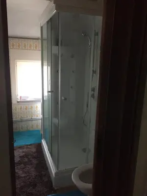 a bathroom with a shower and a sink at Au 194 in Liège