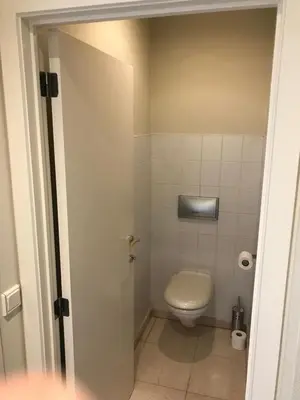 a small bathroom with a toilet in a room at Vakantiehuis Piantho in Overpelt