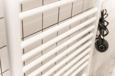 a close up of a white door in a bathroom at Appartement Guillemins Station Terrace in Liège