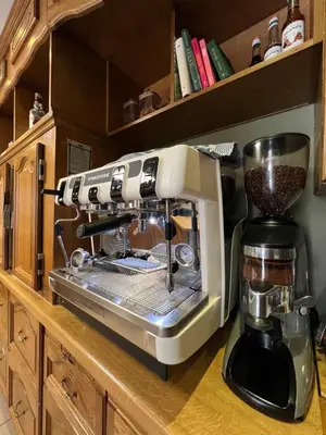a coffee maker sitting on a counter in a kitchen at Hotel De Venne in Genk