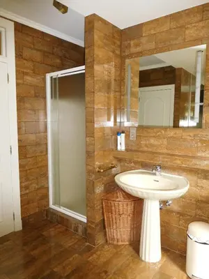a bathroom with a sink and a mirror at Suite Horatio in Heusden - Zolder