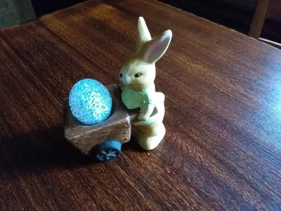 a figurine of a bunny and an egg on a table at Auberge 's Gravenhof in Voeren