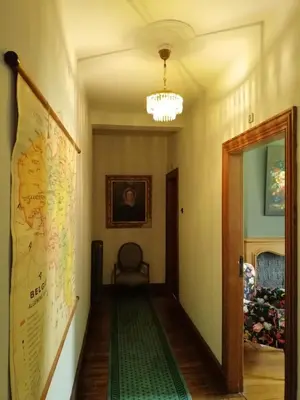 a hallway with a large map on the wall at Het Domherenhuis B&B, Restaurant Calice in Heusden - Zolder