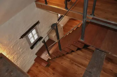 an overhead view of a wooden stairs with a window at Een vleugje wellness in de Voerstreek - Bed & Brocante Onder de Poort in Voeren