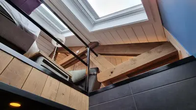 an overhead view of a ceiling with a skylight at Een vleugje wellness in de Voerstreek - Bed & Brocante Onder de Poort in Voeren