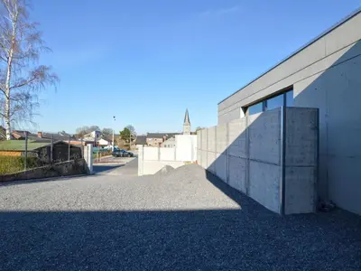 a building with a door on the side of it at Dalhem Villa with Garden in Dalhem