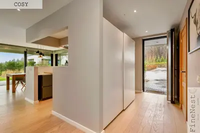 an open kitchen and dining room with white walls at Résidence de 3 appartements luxueux - 2 ch x 3 - 