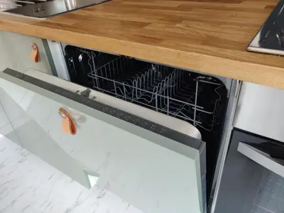 a dishwasher with a dish rack inside of it at Wetterdelle Lodge in Heers