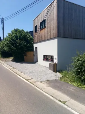 a building on the side of a street at Maison à la porte des Ardennes in Verviers