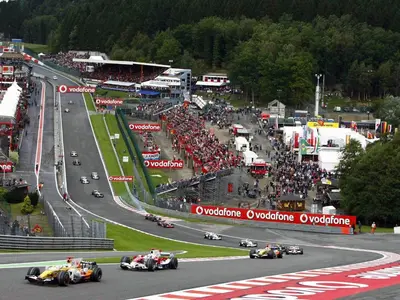 a group of racing cars on a race track at Maison à la porte des Ardennes in Verviers