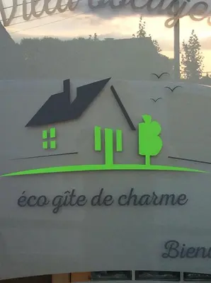 a sign for a house with a logo on it at Éco Gîtes Aubelrando & villa-bocage in Aubel