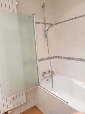 a bathroom with a shower and a bath tub at Espace Douffet - Un havre de paix en pleine ville in Liège