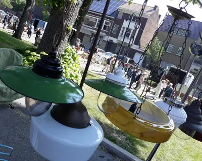 two bowls and a banana on a street at VillaEnzo - ELEGANT HERENHUIS - 14P - 6SLPK - SAUNA - INFRAR CABINE - OFYR BBQ - 15MIN Maastricht in Zussen