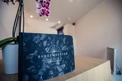 a book sitting on top of a counter at Burgemeesterhuys in Beringen