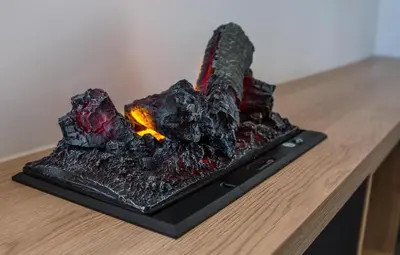 a model of a volcano on a table at Les gîtes de Bouxhmont in Herve