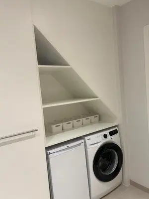 a laundry room with a washer and dryer at Vakantiewoning Laurijn in Bilzen