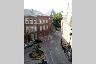 a view of a city street with buildings at Studio donceel in Liège