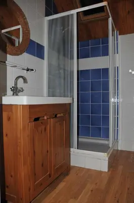 a kitchen with a sink and a window at La Source du Broly in Soumagne