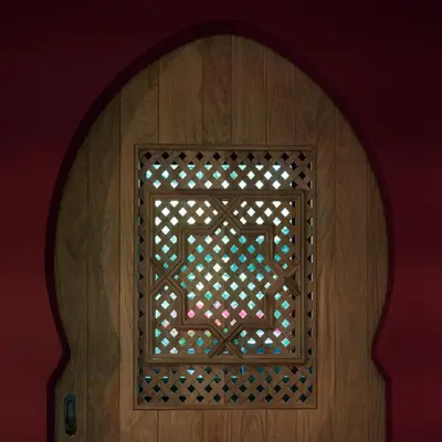 a wooden door with a window in a room at Un air de bourlingueurs in Pepinster