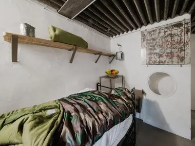 a room with a bed with a blanket on it at Holiday home in Vise Richelle near town in Richelle
