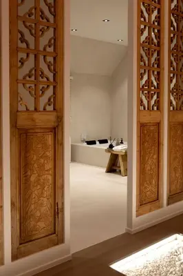 an open door leading into a room with a table at Wabi Sabi B&B in Peer