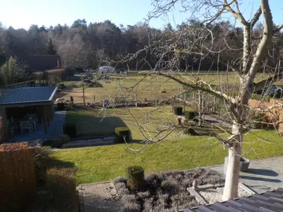 a view of a garden from the roof of a house at Bosrand81 in Hechtel