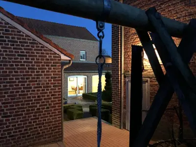 a view of the entrance to a brick building at Hoeve de Singel in Borgloon