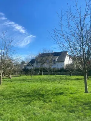 a large white house in a field of green grass at Nummer 151 villastudios in Hasselt