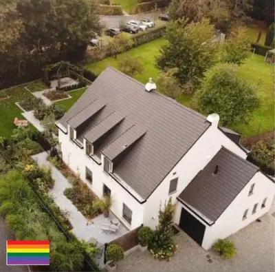 an aerial view of a white house at Nummer 151 villastudios in Hasselt