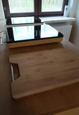 a glass box sitting on top of a wooden table at Wonderwall in Houthalen-Helchteren
