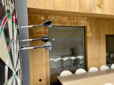a bike parked in a room with a mirror at Vakantiehuis Sahara119 in Lommel