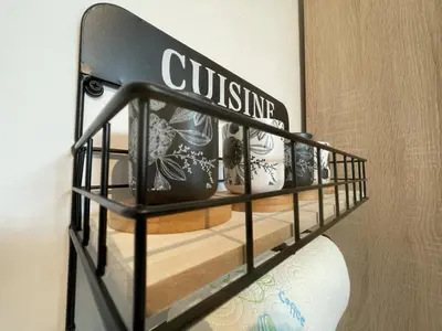 a black shelf with someousandousandousandousandousandousandousandousandousandousandousand at Patenier Hidden Garden 1bdr with garden in Liège