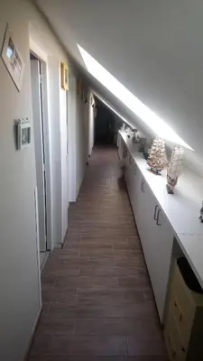 a hallway in an office with a long hallway at Superb vacancy at Patricks house in Ketzingen