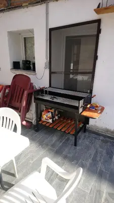 a piano sitting on top of a table with chairs at Superb vacancy at Patricks house in Ketzingen