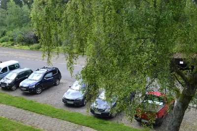 a group of cars parked in a parking lot at Calme et verdure 9 in La Calamine